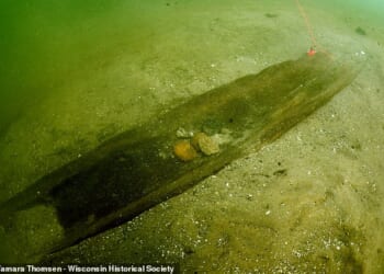 The boats in Lake Mendota are known as dugout canoes because each was constructed out of a single tree trunk