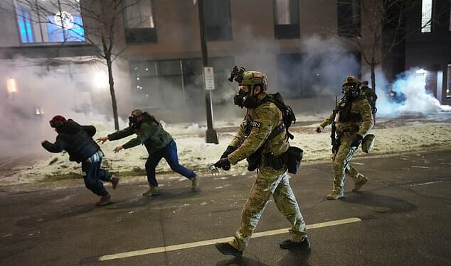 Authorities cleared out the crowd of protestors in front of the hotel on Sunday night