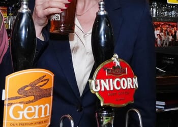 Mutinous Labour MPs were told that Rachel Reeves will announce a package of emergency help within days in a bid to head off a brewing revolt. Pictured: Reeves visits a pub in the West Midlands on the 2024 General Election campaign trail