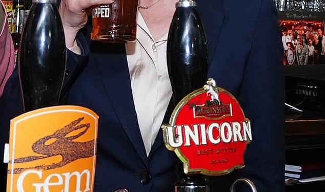 Mutinous Labour MPs were told that Rachel Reeves will announce a package of emergency help within days in a bid to head off a brewing revolt. Pictured: Reeves visits a pub in the West Midlands on the 2024 General Election campaign trail