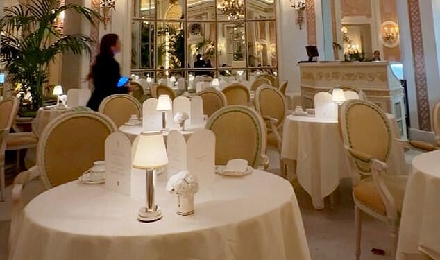 The rodent (bottom right) was spotted by customers as they took tea at the salubrious venue in Mayfair, London, on Sunday