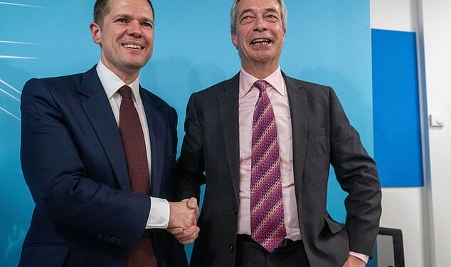 Robert Jenrick and Reform UK leader Nigel Farage answer questions from the media during the Reform conference in London following the former Tory's defection
