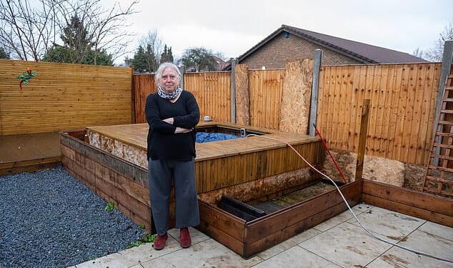 Rose Smith, 60, built new decking around her hot tub last year but then she claims her neighbour destroyed her fence and the deck, claiming they own the land