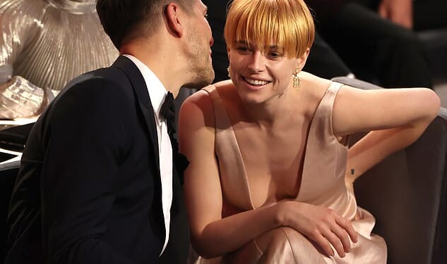 Oscar-nominated actress Jessie Buckley's husband is a former X Factor producer who worked alongside Simon Cowell, The Daily Mail can reveal (pictured 2022)