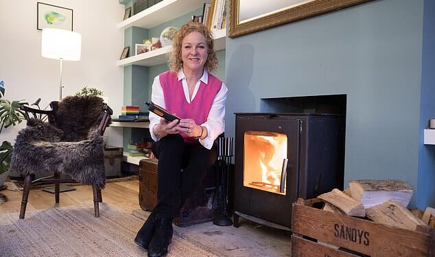Louise Atkinson (pictured) asks: 'Are you risking your health and that of your neighbours every time you light your wood burner?'