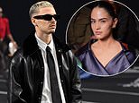 Romeo Beckham walks in the Willy Chavarria show at Paris Fashion Week as girlfriend Kim Turnbull bags herself a seat in the FROW amid Beckham family fall-out