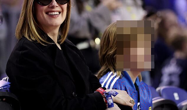 Rosamund Pike enjoyed a rare outing with youngest son Atom as they attended NBA's London Game 2026 which saw the Memphis Grizzlies take on Orlando Magic at the O2 on Sunday