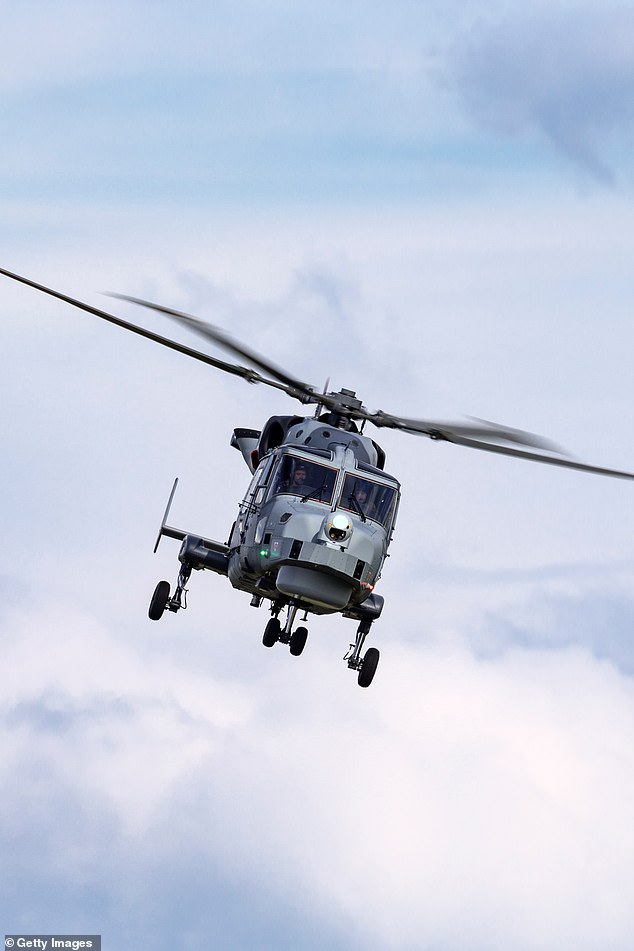 A Royal Navy Fleet Air Arm Agusta Westland Wildcat helicopter is pictured here approaching to land at RAF Waddington in Lincolnshire  in July 2014
