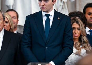 Barron Trump phoned the City of London Police from the US and told a call handler: 'I just got a call from a girl I know. She's getting beaten up'. The man accused of raping the woman was 'upset' that she had been texting Barron