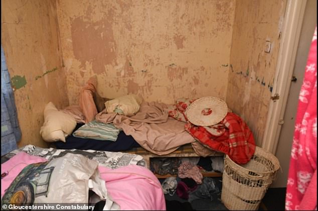 An image released by police of the victim's cluttered and undecorated bedroom