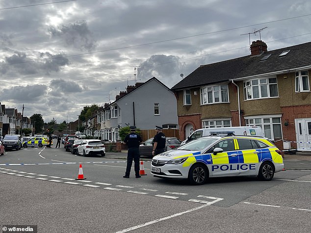 Police officers at the scene on Nunnery Lane in Luton after the stabbing in September 2023