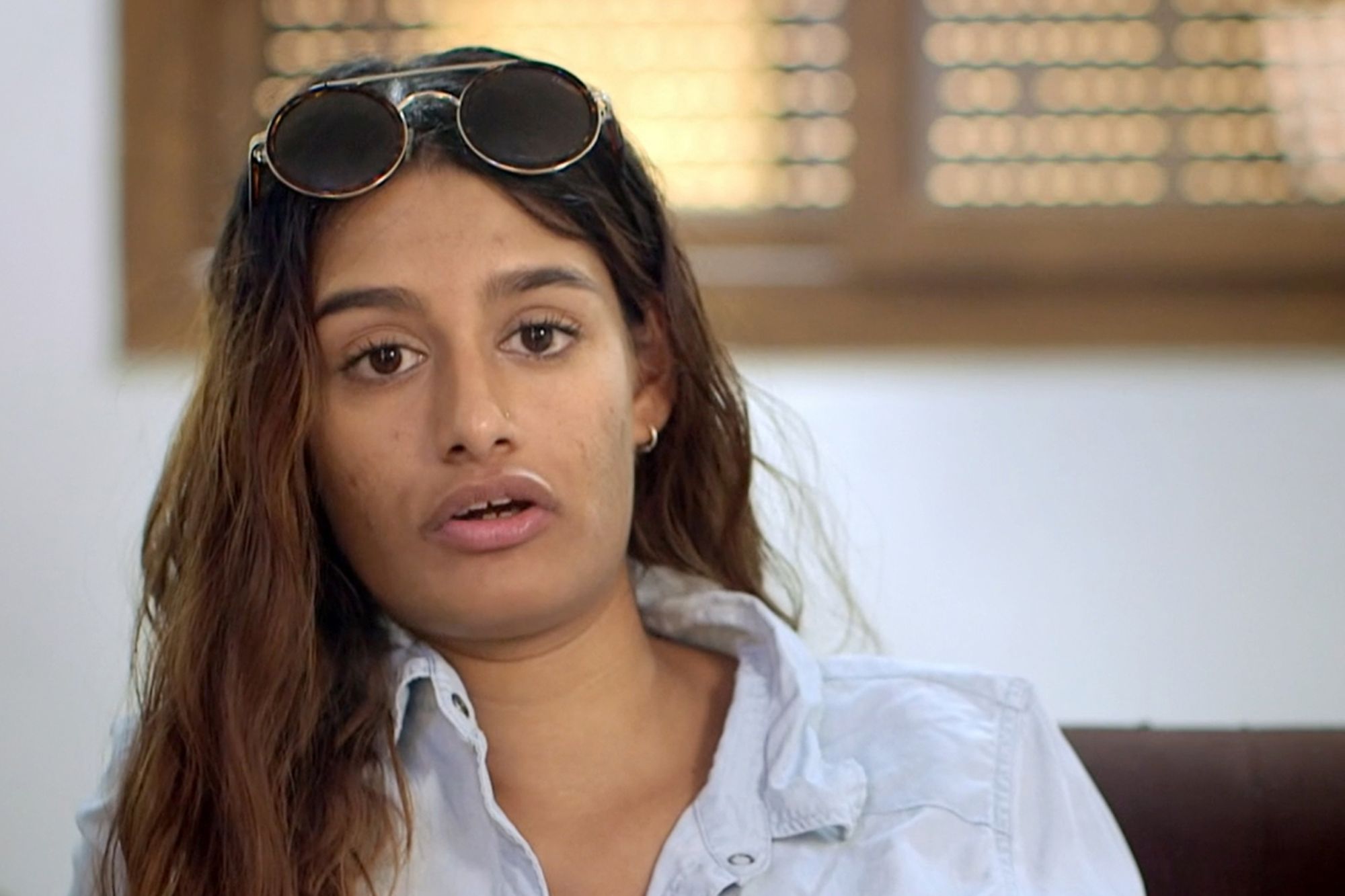 An image collage containing 1 images, Image 1 shows Shamima Begum in a still from the BBC show "The Shamima Begum Story."