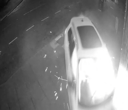 Shocking moment driver with no licence speeds down road and smashes Audi straight into barber shop