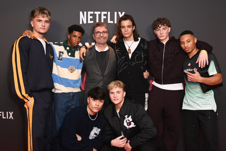 Simon Cowell with Hendrik Christoffersen, John Fadare, Danny Bretherton, Sean Hayden, Nicolas Alves, Josh Olliver, and Cruz Lee-Ojo at a special screening for "Simon Cowell: The Next Act."