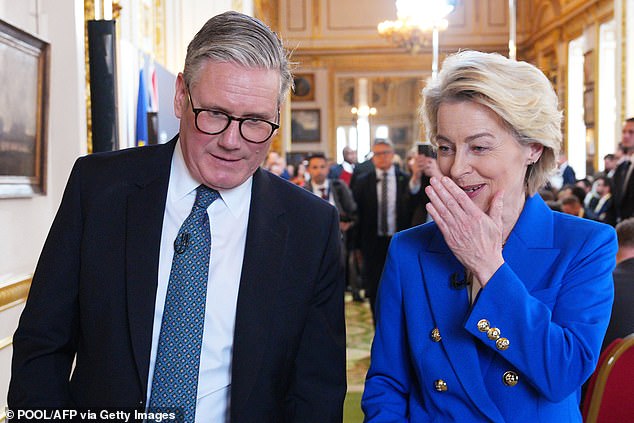 Prime Minister Sir Keir Starmer (left) speaks to European Commission President Ursula von der Leyen (rigtht) during the UK-EU Summit at Lancaster House in London on May 19, 2025