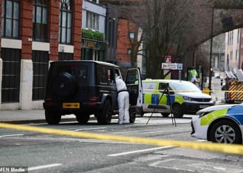 Emergency services rushed to Manchester city centre, where police found a man, aged in his 20s, with a gunshot wound to his leg inside a property at around 5am this morning
