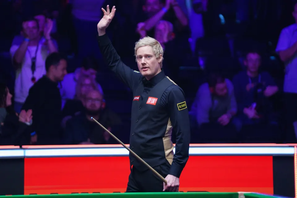 Neil Robertson celebrating his win at the Johnstone's Paint Masters Snooker 2026.