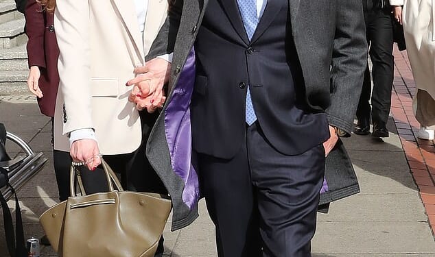 James Stunt pictured outside Leeds Crown Court with his girlfriend Helena Robinson where he was cleared of any involvement in a £266m money laundering ring