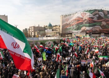 A crowd gathers Monday during what was described as a pro-government rally in Tehran, Iran.