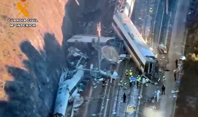 At least 39 people are confirmed dead following a high-speed train collision in southern Spain. Pictured: Emergency workers are seen at the site where a high-speed Iryo train derailed and was hit by another train as rescue efforts continue in Adamuz, southern Spain, on January 19, 2026