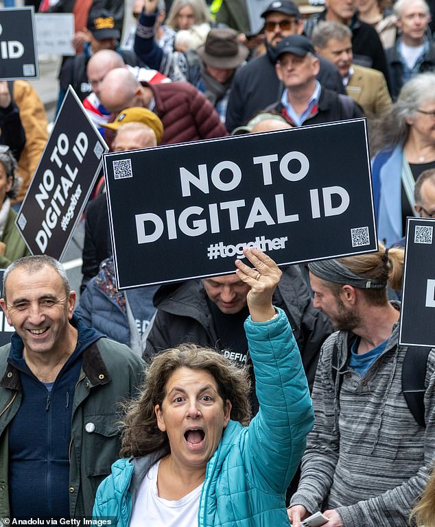 Protesters march against UK Government's plan to introduce a digital identification card in central in London, United Kingdom on October 18, 2025