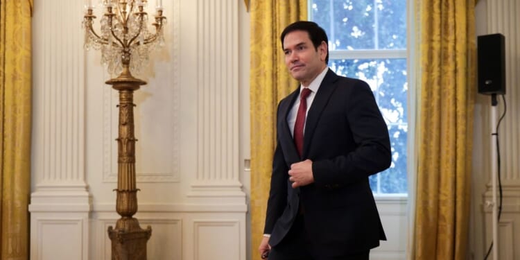 Secretary of State Marco Rubio arrives for a meeting with President Donald Trump and oil and gas executives in the East Room of the White House on Jan. 9, 2026, in Washington, D.C.