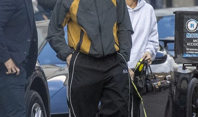 Romeo Beckham was spotted out and about in Notting Hill, London, with his girlfriend Kim Turnbull on Tuesday - his first public appearance since brother Brooklyn launched an astonishing attack on their parents