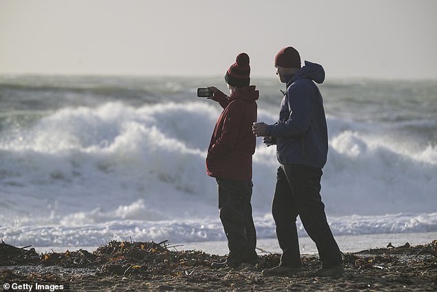 Large waves caused by Storm Ingrid strike Gyllyngvase Beach in Falmouth, Cornwall, today