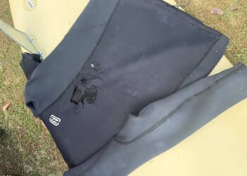 A surfer had minor injuries from being bitten by a shark Tuesday in the fourth attack off the coast of Australia's most populous state in three days. It's understood the shark bit through the man's wetsuit and took a chunk out of his board