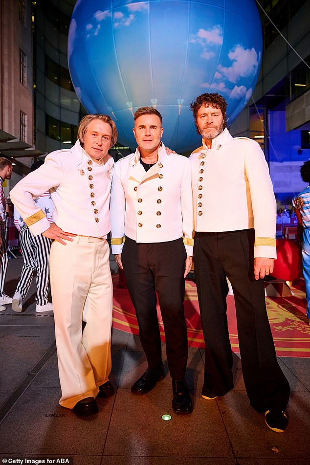 Nowadays it's just Mark, Gary and Howard left in the group after Jason quit the band and Robbie went back to his solo career (pictured in September)