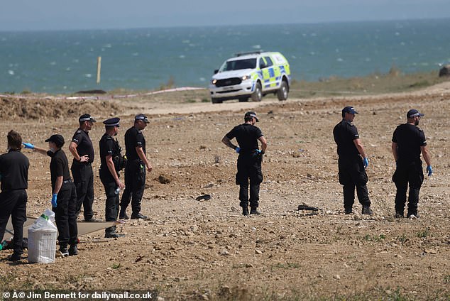 Police search the area around Leysdown-on-Sea in the aftermath of the incident
