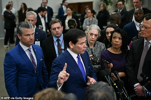 (L/R) US Secretary of Defense Pete Hegseth and US Secretary of State Marco Rubio speak to reporters after they briefed Senators on the recent US military actions in Venezuela, on Capitol Hill in Washington, DC on January 7, 2026. (Photo by Brendan SMIALOWSKI / AFP via Getty Images)