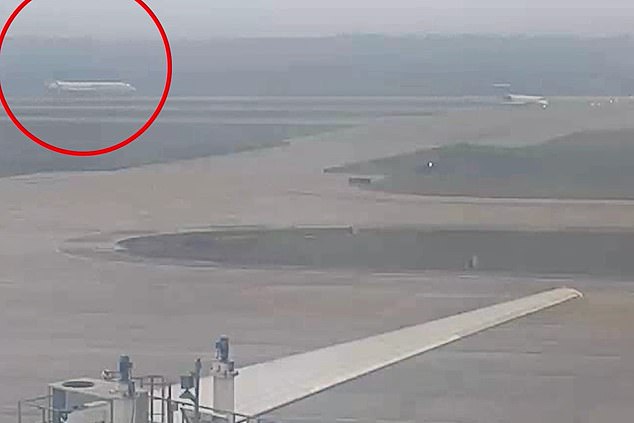 New surveillance footage shows the moment a United Boeing 737 MAX skidded while coming into land on a wet runway in 2024