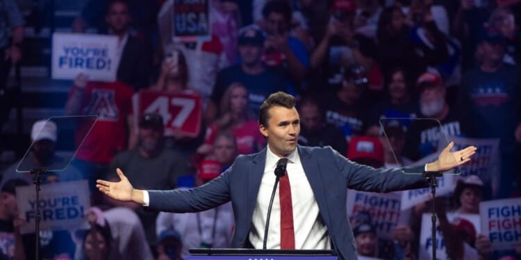 Turning Point USA founder Charlie Kirk speaks during a campaign rally for President Donald Trump at Desert Diamond Arena on Aug. 23, 2024, in Glendale, Arizona.