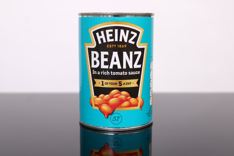 Rod Ferrell photographed counting / checking baked beans by Oliver Dixon for Sun Features - 19 Jan 2023. Photo shows Heinz