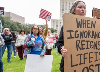 Women's March Network protesters against President Donald Trump are pictured during a Jan. 20 demonstration outside Houston City Hall in Houston, Texas.