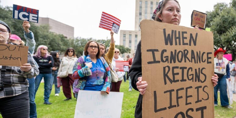 Women's March Network protesters against President Donald Trump are pictured during a Jan. 20 demonstration outside Houston City Hall in Houston, Texas.