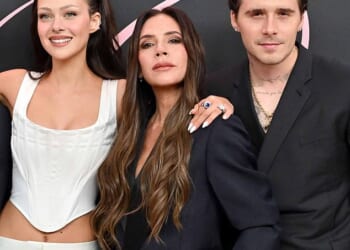 Victoria Beckham has been left 'devastated' after taking the brunt in the vicious family fallout with son Brooklyn and his wife Nicola Peltz - which has all been sparked by a trademark battle over their family name (pictured in February 2024)