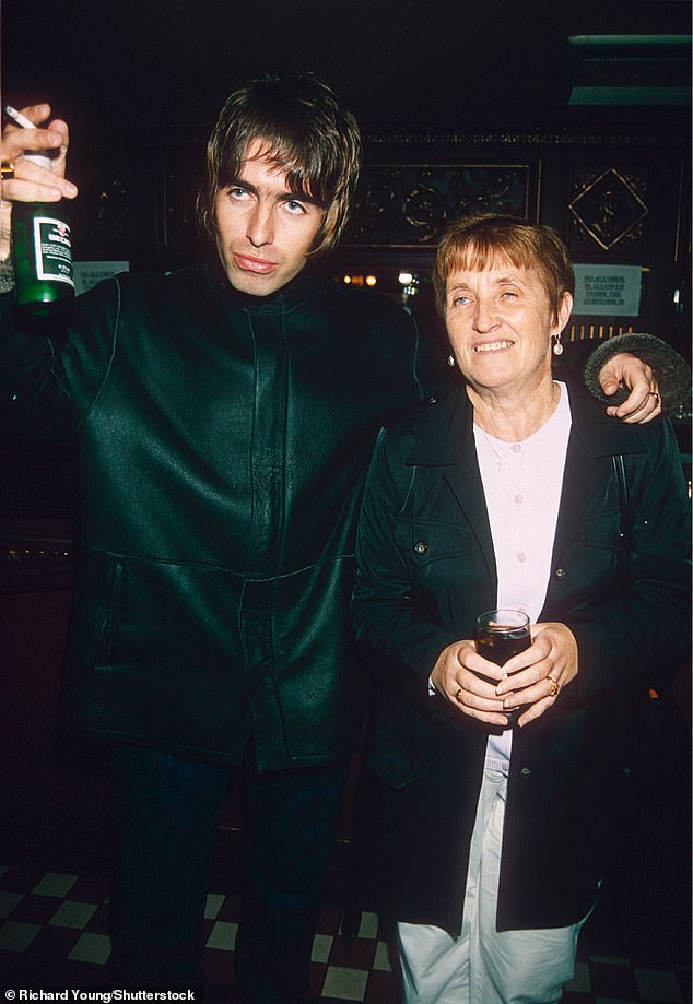 Liam and Noel Gallagher's mother Peggy has remained in the same council house in Manchester where the brothers grew up (pictured with Liam in 1998)