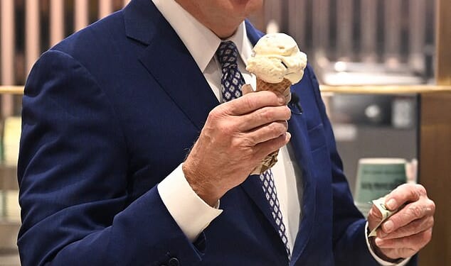 Former president Joe Biden, a self-proclaimed ice cream enthusiast, is seen above eating a cone on Late Night with Seth Meyers in 2024