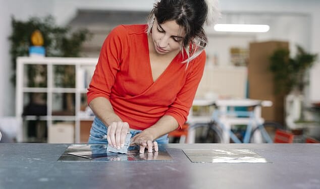 Engravery is the practice of creating designs, text, or patterns by cutting, carving, or etching into a surface like metal, wood, glass, or stone using hand tools