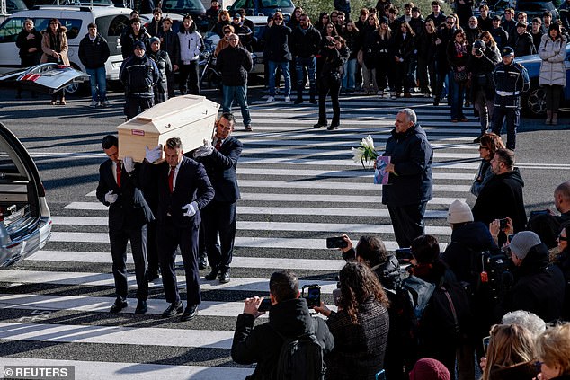 Pallbearers carry the coffin of 16-year-old Riccardo Minghetti, who died at the "Le Constellation" bar in Crans-Montana, Switzerland during a New Year's Eve party, during his funeral at the Basilica of Saints Peter and Paul in Rome, Italy, January 7, 2026