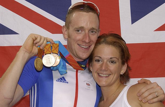 Bradley and Cath at the 2004 Olympic Games, held in Athens, celebrating his gold, silver and bronze medals
