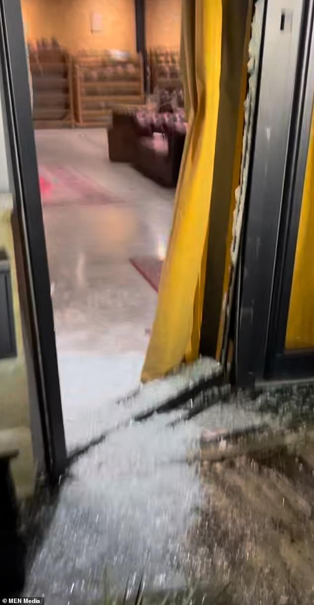 The door to Lanx Shoes in Whalley, Lancashire, was smashed in by the burglars