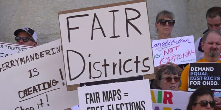 This photo taken from video shows organizers rallying outside of the Ohio Statehouse to protest gerrymandering and advocate for lawmakers to draw fair maps in Columbus, Ohio, on Sept. 17, 2025.