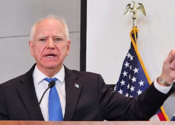 Minnesota Gov. Tim Walz gestures during a December news conference in St. Paul.