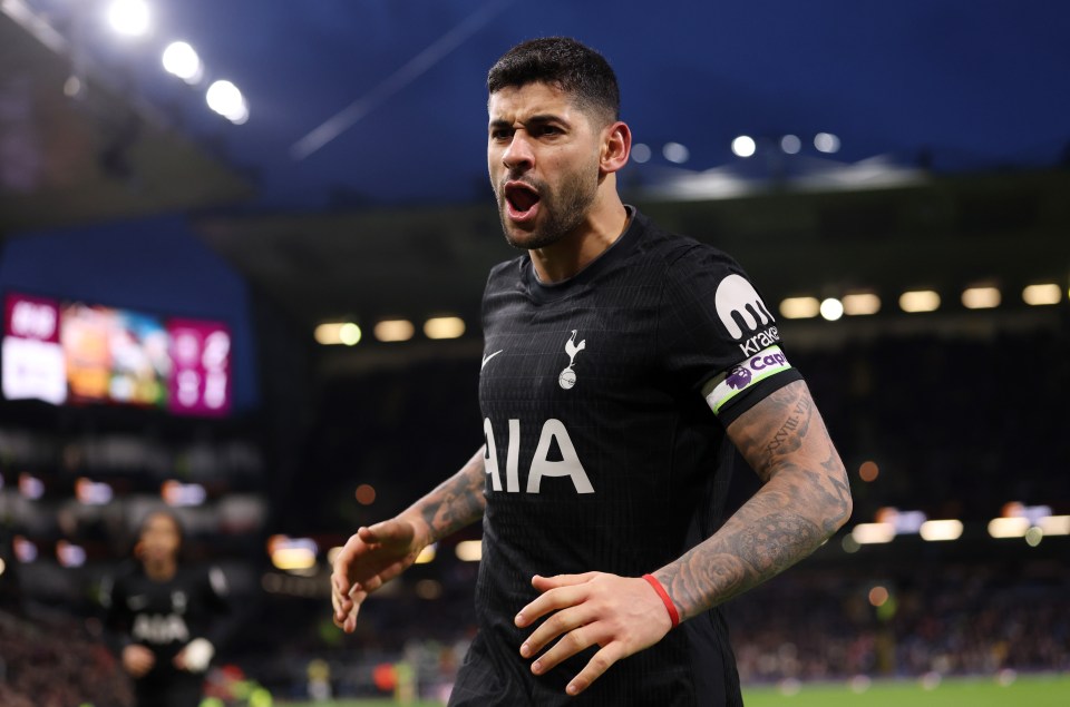 Cristian Romero celebrating a goal during a Premier League match.