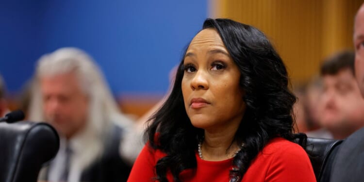 Fulton County District Attorney Fani Willis looks on during a hearing in the case of the State of Georgia v. Donald John Trump at the Fulton County Courthouse on March 1, 2024, in Atlanta, Georgia.