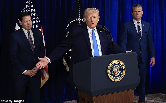 President Donald Trump (center) suggested that Secretary of State Marco Rubio (left) and Defense Secretary Pete Hegseth (right) would be running Venezuela for the foreseeable future