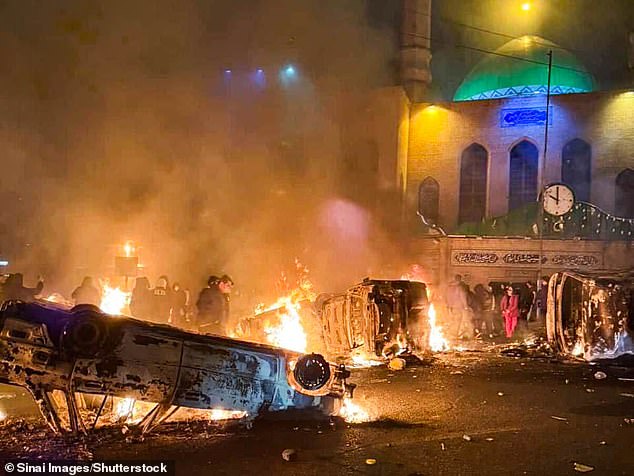 Images appeared to show a huge fire ripping through a government building in Karaj, near Tehran